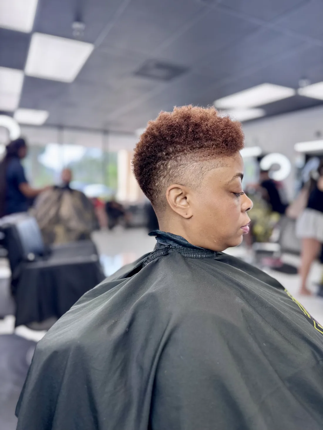 Tapered cut with custom color at a Tampa barbershop